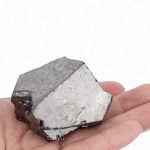 Elite shungite raw stone in hand