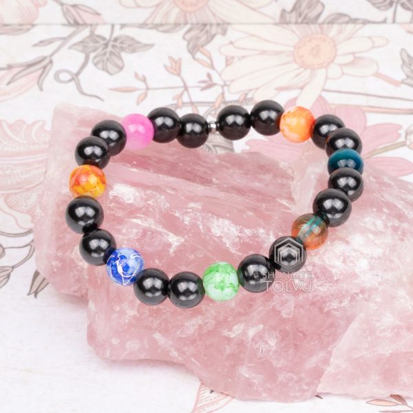 Rear view of chakra bracelet showing bead layout and elastic cord