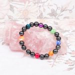 Close-up of chakra bracelet colored beads