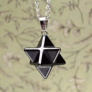Merkaba pendant necklace close-up with stainless steel chain