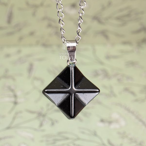 Hand-carved star-shaped pendant with chain
