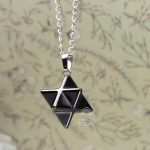 Small carved stone star necklace