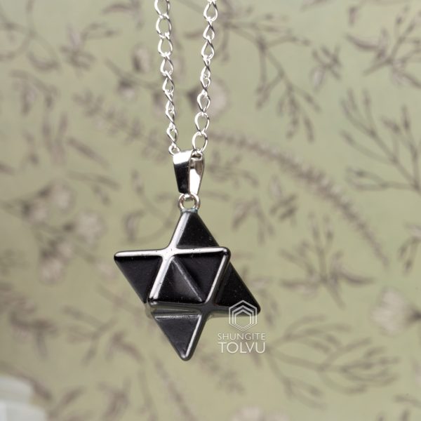 Small carved stone star necklace