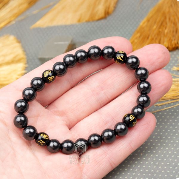 shungite feng shui bracelet in hand