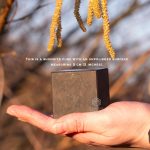 Large shungite cube showing pyrite veins